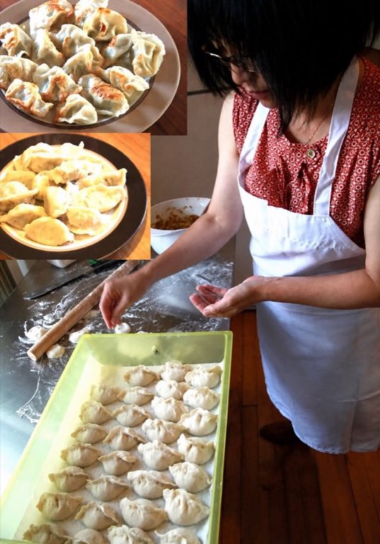 The hands behind the hut, Haiqin folding tray after tray by hand — the heart of the kitchen.